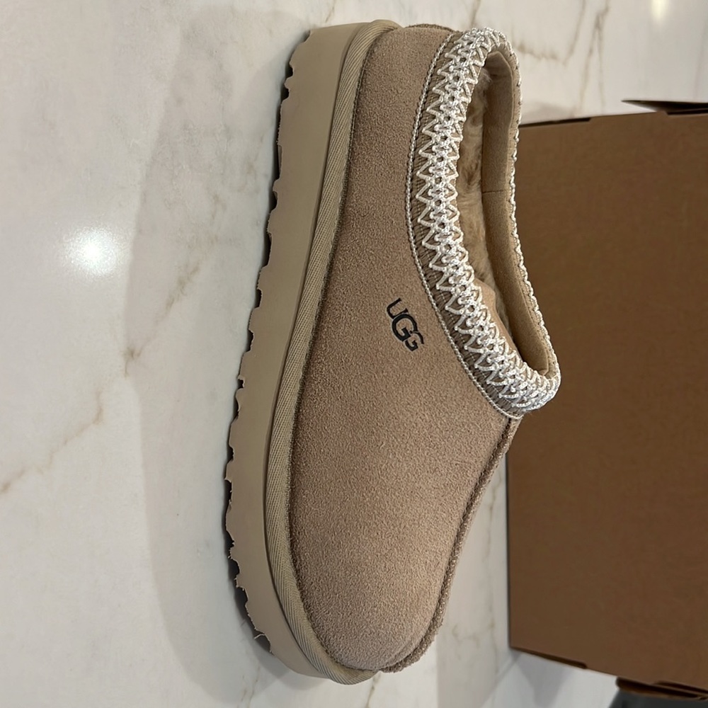 UGG Tasman mustard seed size 6.  Brand new, never been worn.